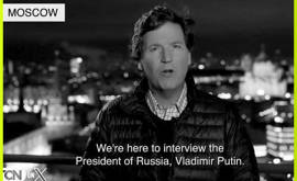 Tucker Carlson Intervista Putin mentre Evan Gershkovich è in Carcere